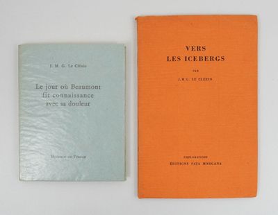 two books sitting on top of a table next to each other