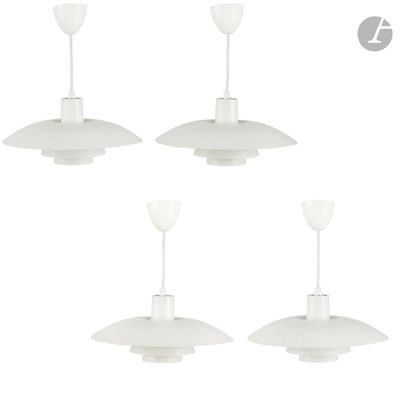set of four white ceiling lights with glass shades on each of them