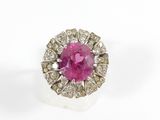 a pink sapphire and diamond cluster ring