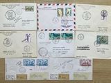 many different types of stamps on the envelopes