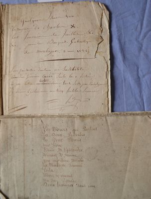 a piece of paper with writing on it sitting on a table