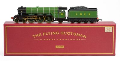 the flying scotsman train is on display in a red box