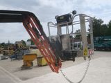 a crane that is attached to the back of a truck