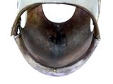 a close up of a helmet with a metal ring on it