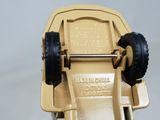 a close up of a toy car with wheels on it