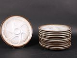 a lot of plates that are stacked on top of each other