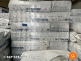 a large pile of mattresses stacked on top of each other