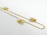 a pair of gold birds on a gold chain