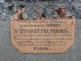 a plaque on the side of a building that says,