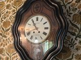 a clock that is on the wall in the room