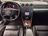dashboard of a car with a steering wheel and dashboard controls