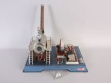 a small model of a small engine on a stand