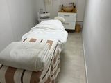 an image of a room with a bed in it
