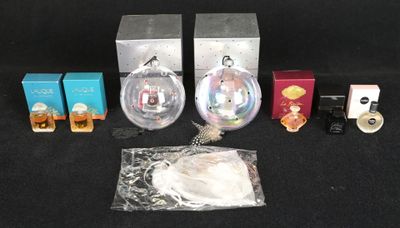 a small collection of miniature toys including a camera and other items