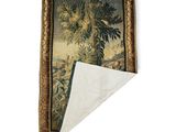 a close up of a piece of fabric with a painting on it