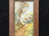 tableau encadré représentant une femme et un cheval sur un sentier