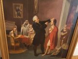 tableau représentant un homme en costume noir et une femme en robe rouge