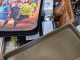 a box full of assorted items including a tray, tray, and other items