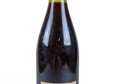 an image of a bottle of wine sitting on top of a table