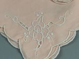 a close up of a piece of cloth with embroidery on it