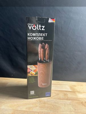 a box that has a knife in it on a table