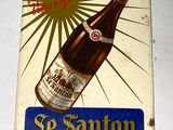 une affiche représentant une bouteille de bière posée sur une table