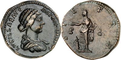 a close up of a coin with an image of a woman on it