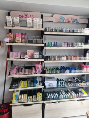 many shelves of nail polish and cosmetics products in this store