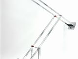 an image of a desk lamp that is on a white surface