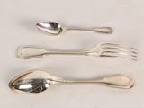 four spoons and a fork on a white table