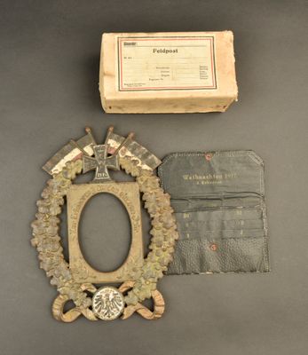 a picture of a picture frame and a wallet on a table