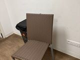 a chair that is sitting in the corner of a room
