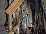 a black bag full of tools sitting on top of a table