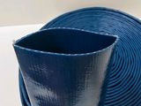 a blue vase sitting on top of a table next to a blue fire hose