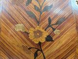 a wooden table with a clock on top of it