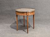 an image of a small round table with a marble top