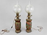 pair of antique lamps with painted glass globes on stands