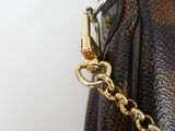 louis vuittoupe bag with gold chain and lock