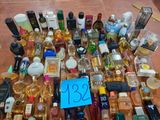 a lot of bottles of perfume on a table