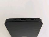 the back of a black iphone with a camera on top of it