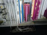 a rack with a bunch of skis on top of it