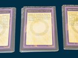 three cards with a purple border and a purple border on them