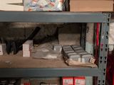 a shelf with many different items on it in a room