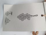 a piece of paper with a drawing of a tower on it