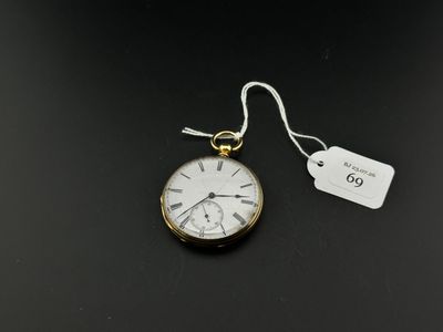 a close up of a pocket watch with a price tag attached to it