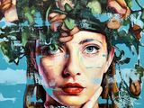 painting of a woman with flowers on her head