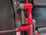 a machine that is sitting on the floor in the gym