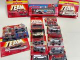 a lot of toy cars that are sitting on a table