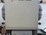 a machine that is sitting inside of a building