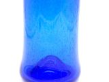 a blue glass vase with a black lid